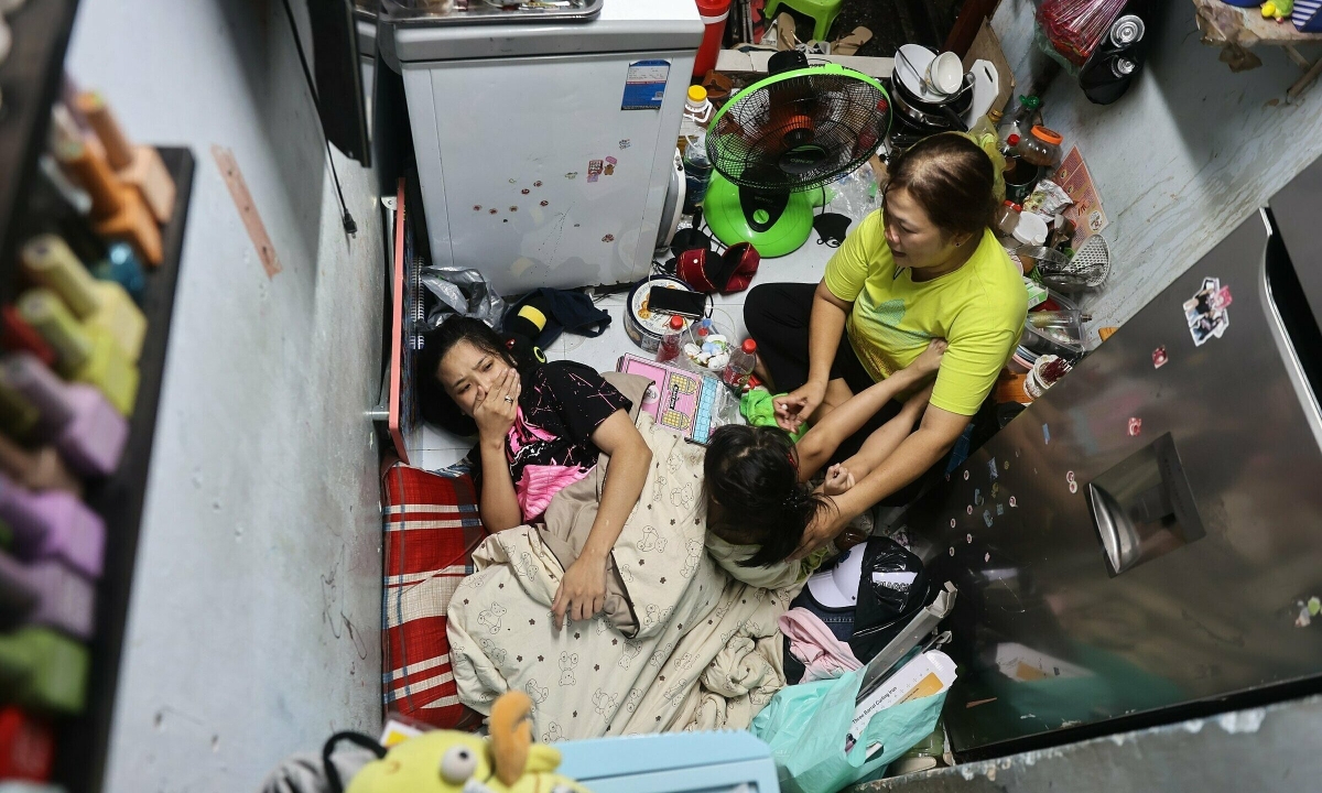 Gallery - Cuộc sống nơi người dân phải 'chia ca ngủ' ở trung tâm TP HCM - Báo VnExpress