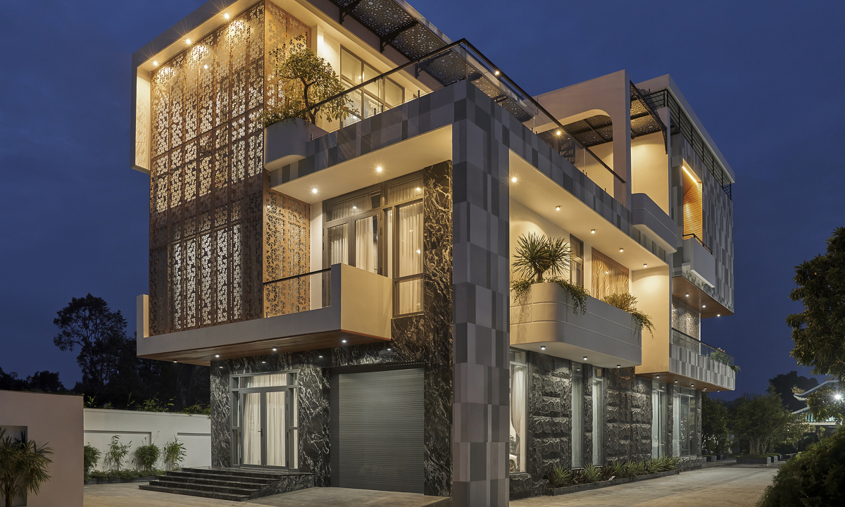 Gallery - Biệt thự hiện đại với vách thép lỗ tạo hiệu ứng 'hoa nắng' - Báo VnExpress